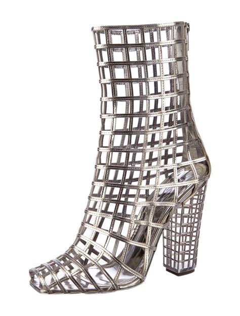 Yves Saint Laurent Caged Boots .